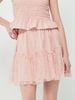 Chân váy màu hồng nhún bèo vải lưới họa tiết